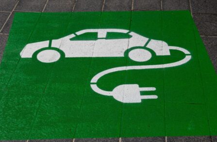 Electric car charge point icon painted on the road