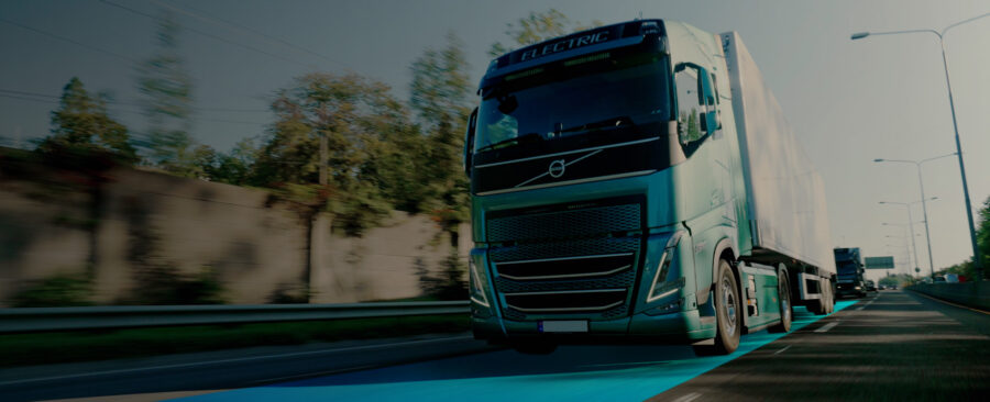 Electric HGV truck driving on road