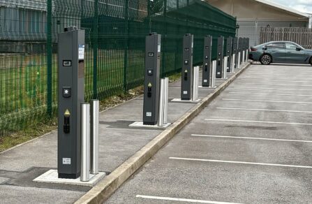 Row of electric vehicle charging points in car park