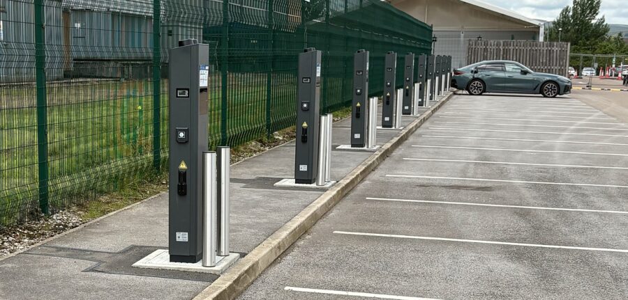Row of electric vehicle charging points in car park